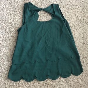 Green scalloped tank with back cut out. Size L.